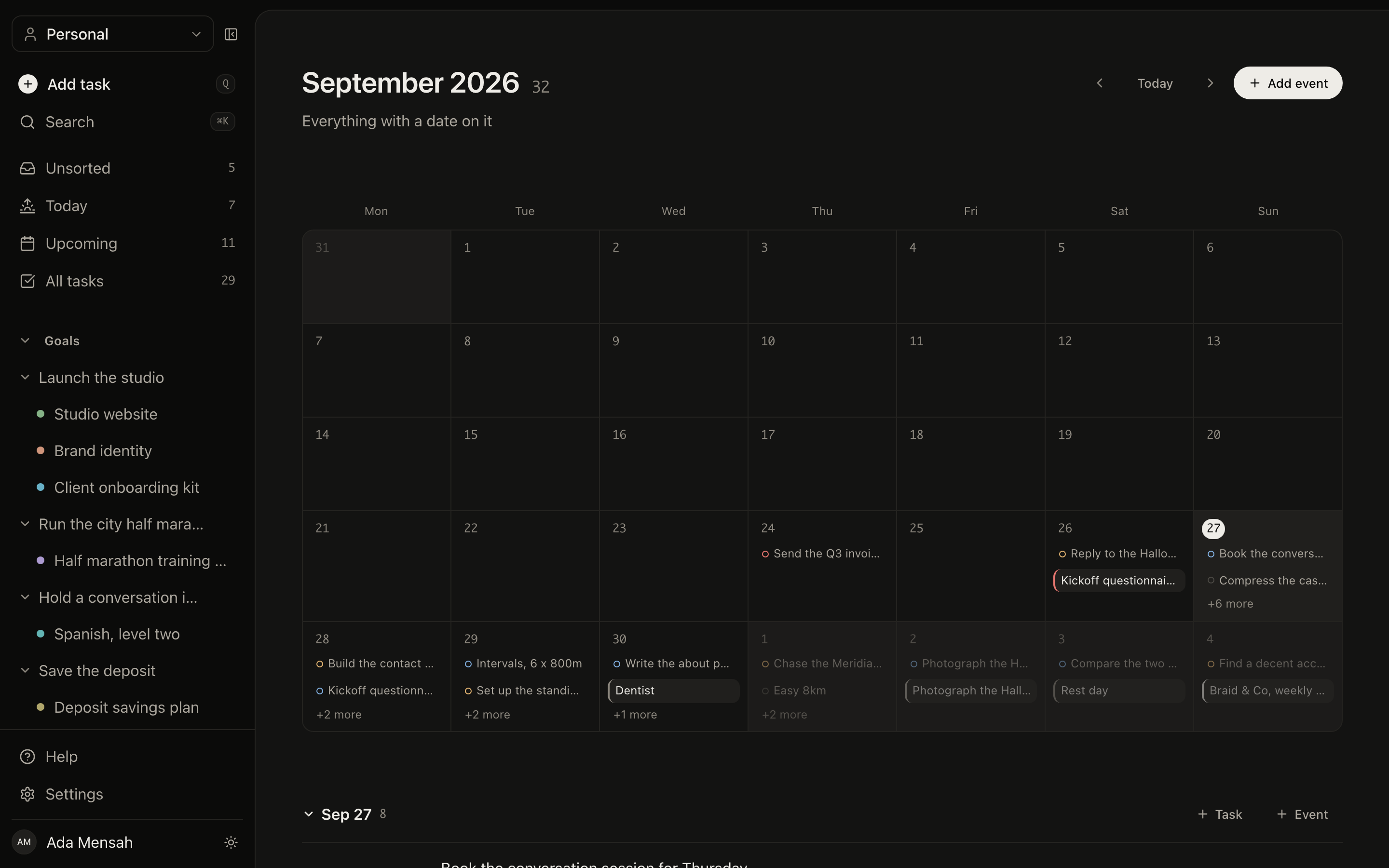 The EvyOS calendar in month view, with events on their dates and a panel showing the selected day's events with their times and durations