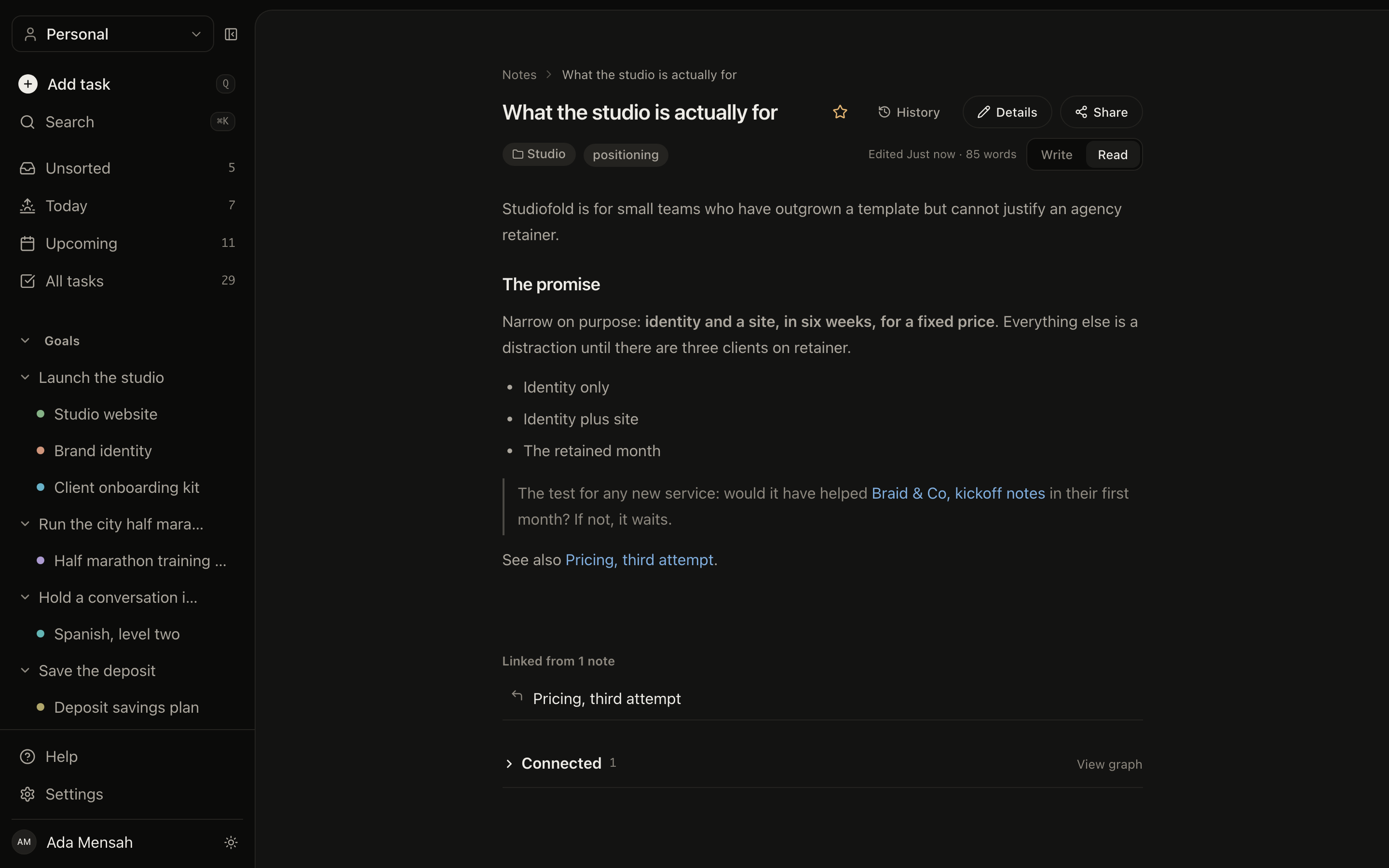 A note open in EvyOS: markdown content with wiki-links, its folder and tags, and the backlinks pointing at it