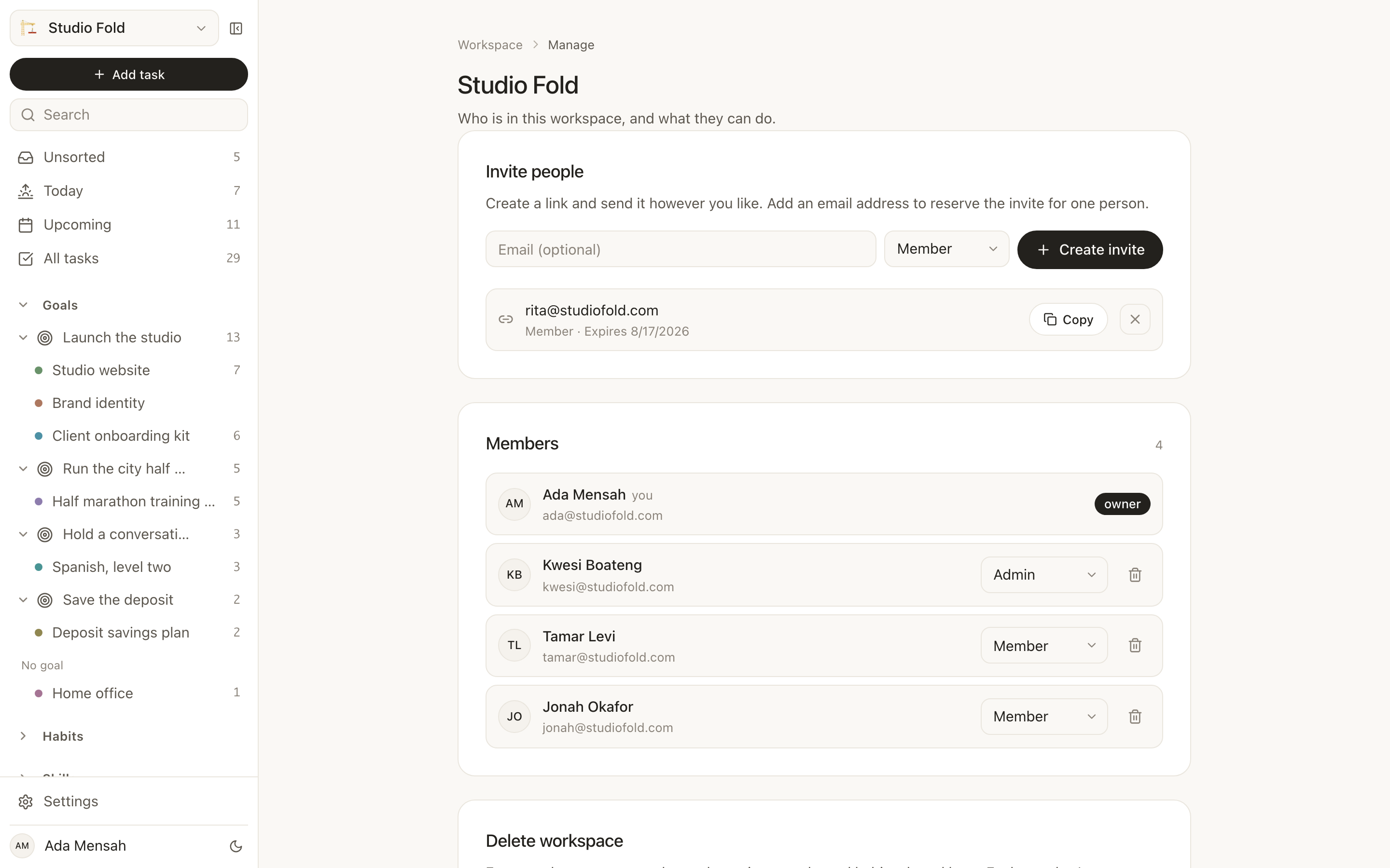 Managing a workspace in EvyOS: creating an invite link, a pending invite with its expiry, and every member with their role